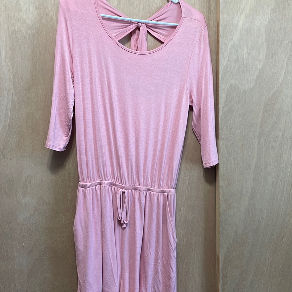 Open back pink romper. Never been worn
